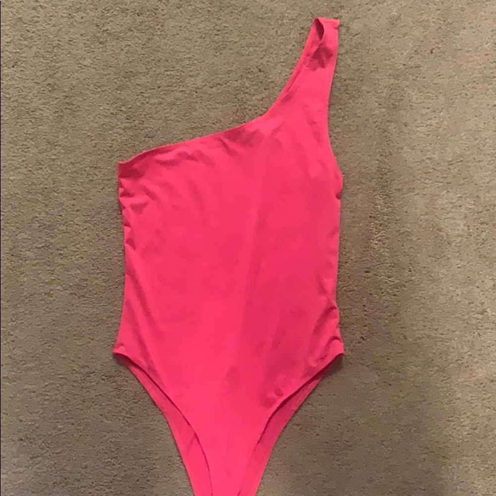 Neon pink one shoulder bodysuit
